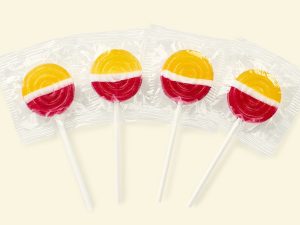 Küfa Lollipop Fruit round, flat, yellow-white-red lollies with lemon taste