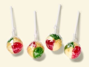 Küfa Fruit Ball yellow-green-red ball-shaped lollies with lemon flavour