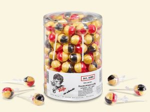 a transparent box with 100 Küfa Deutschland-Lolly black-red-gold (lollipops)