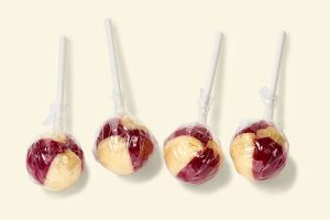 Küfa KiBa-Lolly ball-shaped lollipop with cherry-banana flavor, red/yellow