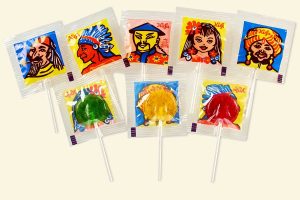 Küfa Candy Pop fruit lollipops in three fruit flavors with faces on the foil