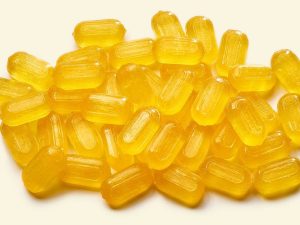 Küfa Anise Sticks (elongated oval yellow candies with anise flavor)