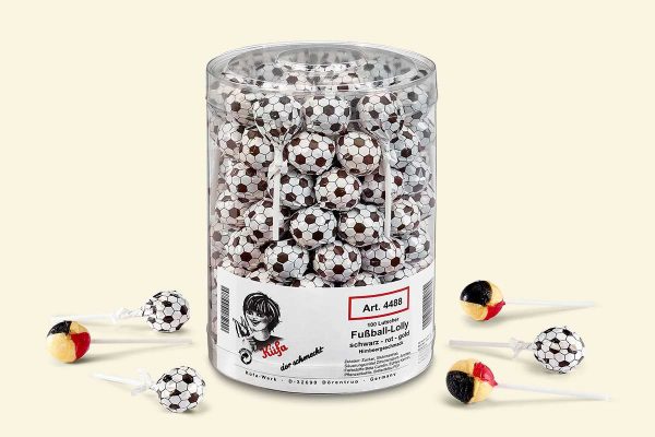 transparent plastic jar with 100 lollipops with soccer ball pattern